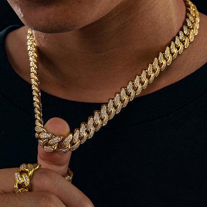 man wearing gold 12mm iced out Miami Cuban chain necklace