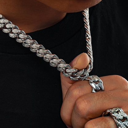 man wearing silver 12mm iced out Miami Cuban chain necklace