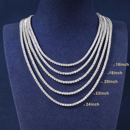 gold iced out chain necklace with CZ diamonds with measurement labels against a dark background