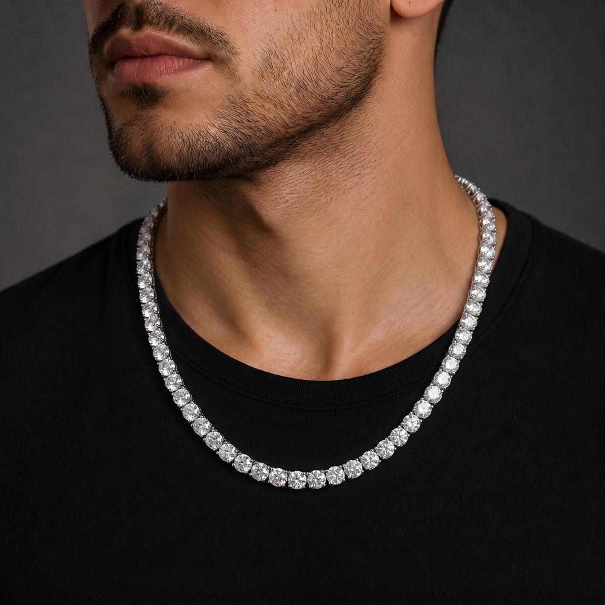 man wearing 4mm silver tennis chain necklace with cubic zirconia stones