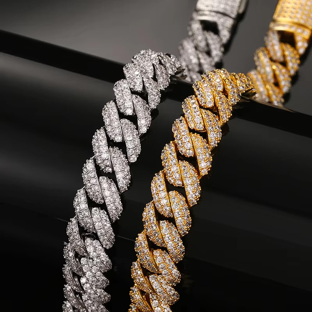 close view of gold and silver 6mm iced out Miami Cuban chain bracelets