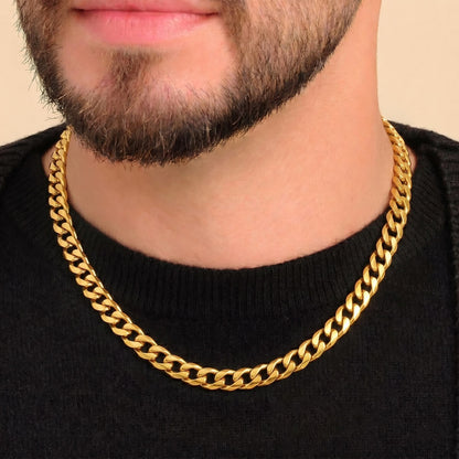 man wearing 6mm gold stainless steel classic Cuban chain necklace