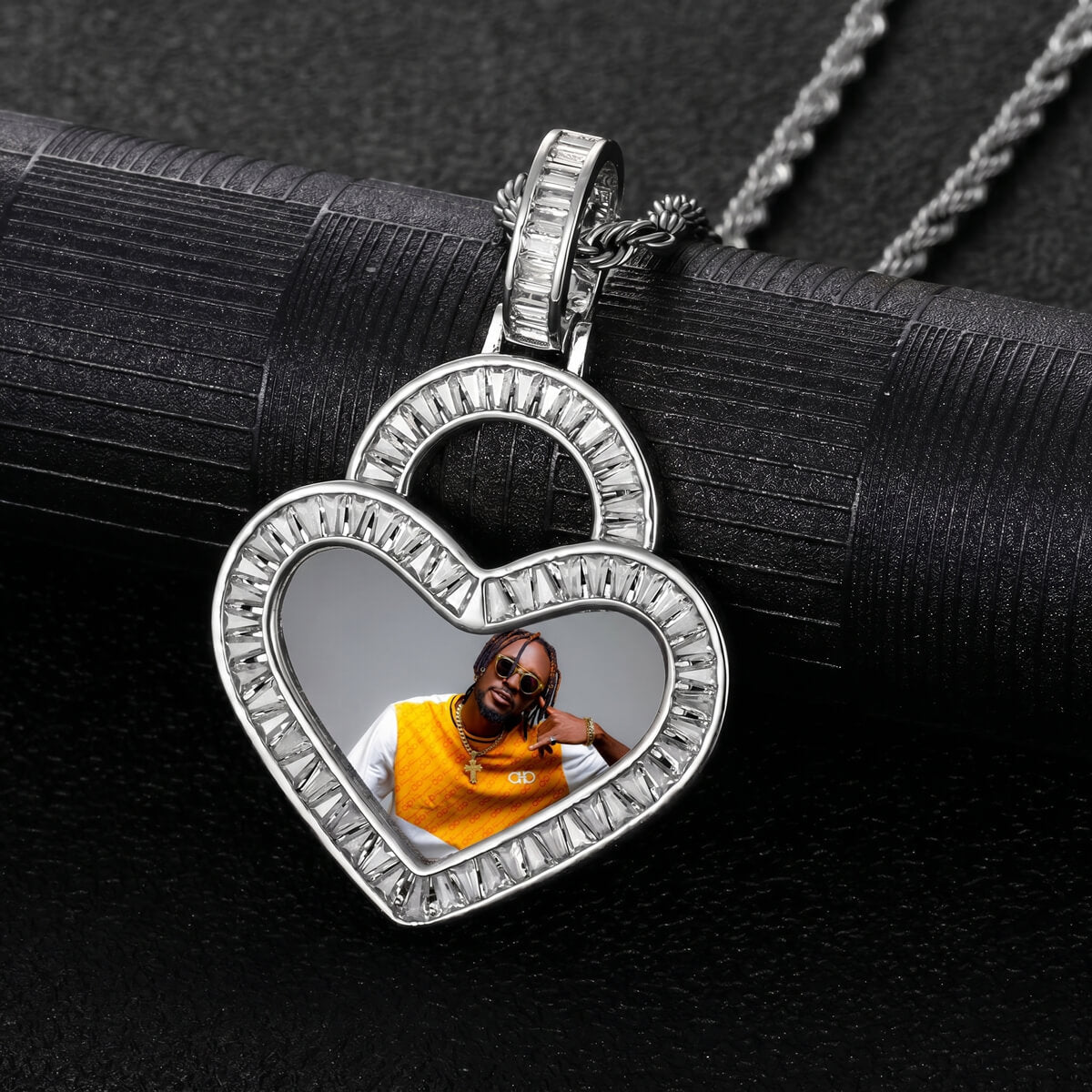 Close-up of iced out custom heart picture pendant