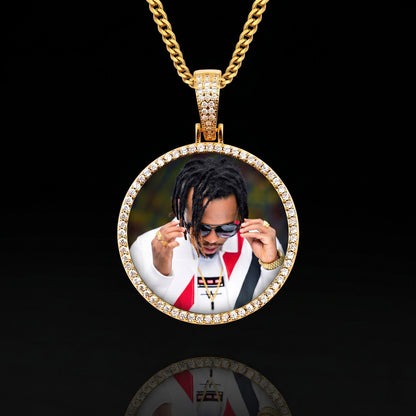 Gold pendant with a photo of a person ,
18k-gold-custom-memorial-chain-front-view.jpg 