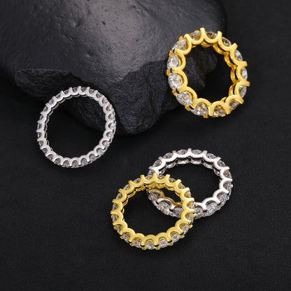 gold and silver CZ eternity band rings side by side
