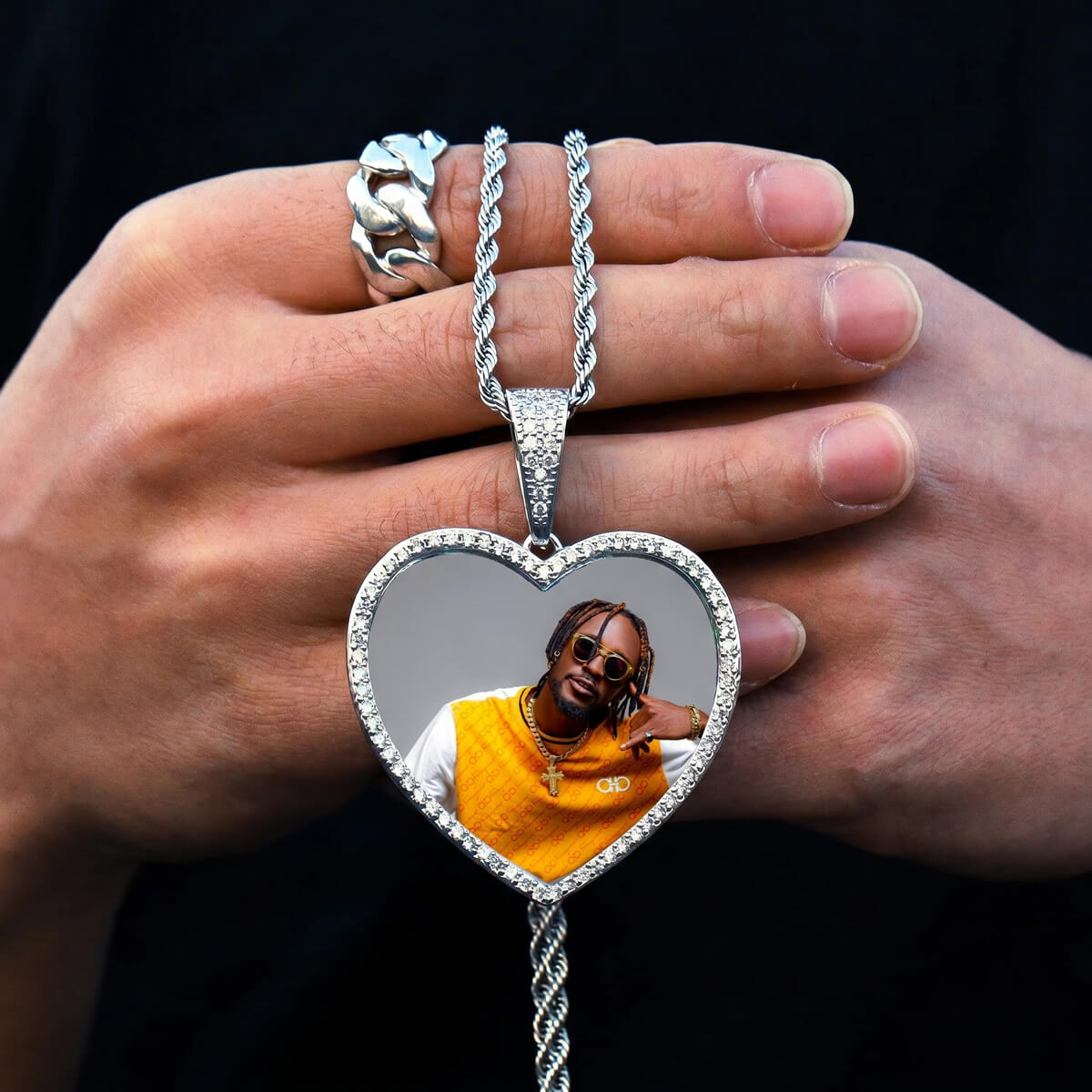 Close-up of custom heart photo pendant necklace