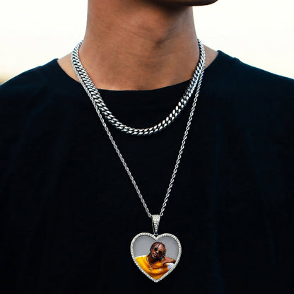 Person wearing personalized heart picture necklace