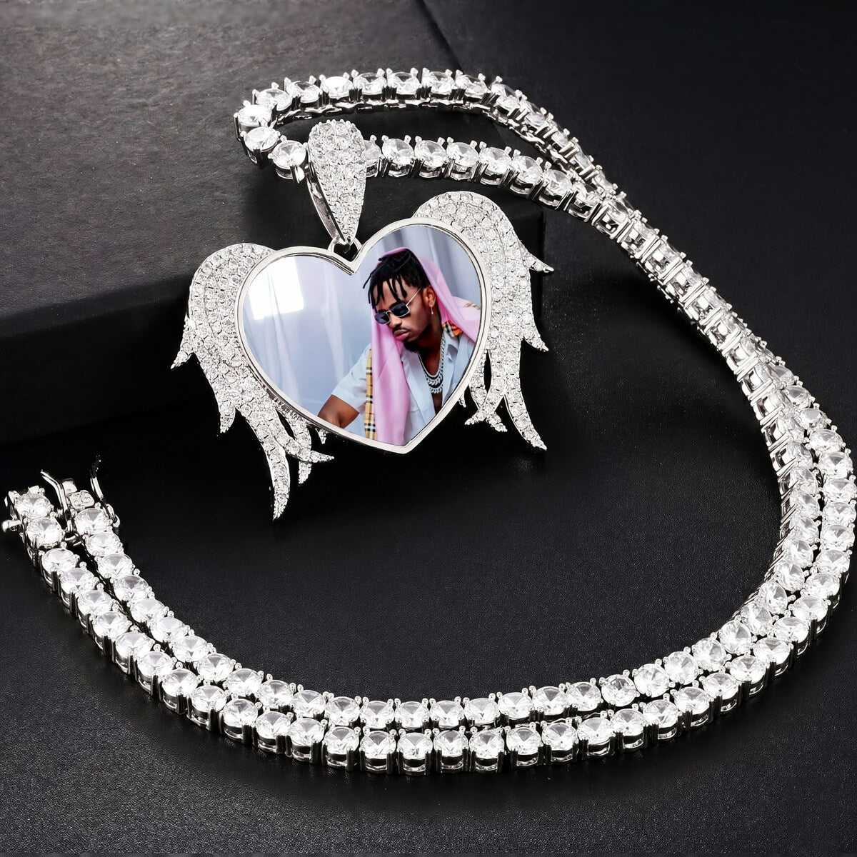 Close-up of heart angel wings pendant necklace