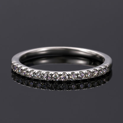 Micro Pavé Half Eternity Wedding Ring in silver featuring brilliant CZ or Moissanite stones with a timeless and elegant design.