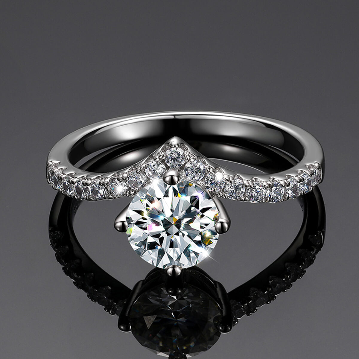 Side view of V-Shape Solitaire Engagement Ring in silver showing the elevated center stone and elegant curved band.